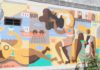 Un mozo da Coruña debuxa un mural en Vilanova como homenaxe á vila e á xente do mar Un mozo da Coruña debuxa un mural en Vilanova como homenaxe á vila e á xente do mar