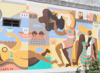 Un mozo da Coruña debuxa un mural en Vilanova como homenaxe á vila e á xente do mar Un mozo da Coruña debuxa un mural en Vilanova como homenaxe á vila e á xente do mar