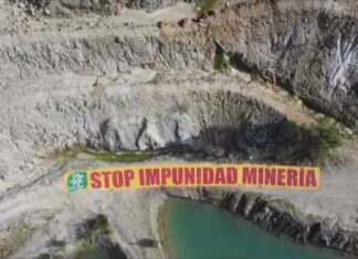 Ecoloxistas en Acción ocupa San Finx e desprega unha pancarta de 14 metros contra a ‘impunidade mineira’